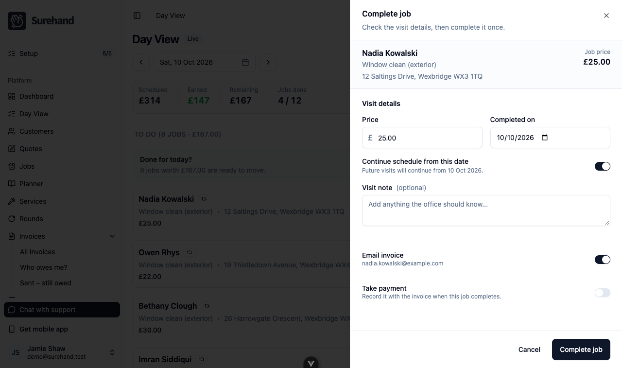 Example data: Day View with the Complete Job panel open for a fictional visit, showing the visit price and the Email invoice switch turned on